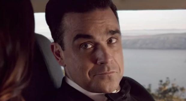 Migros: Robbie Williams tritt gegen George Clooney an