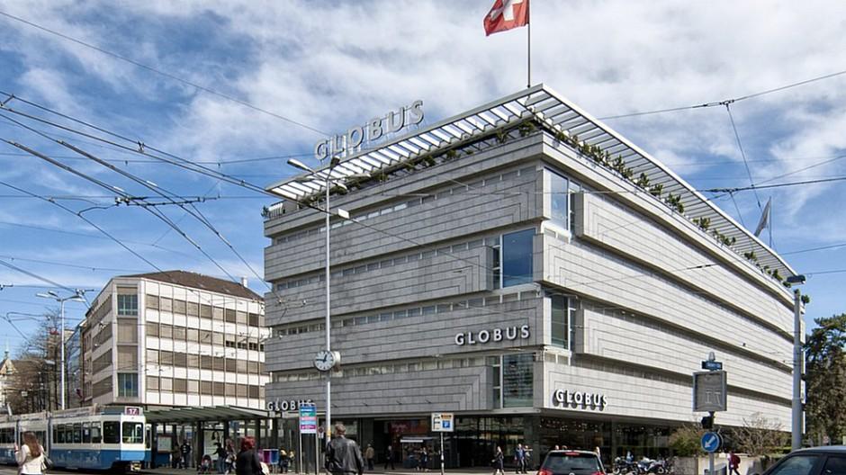 Migros: Schild und Herren-Globus verschwinden